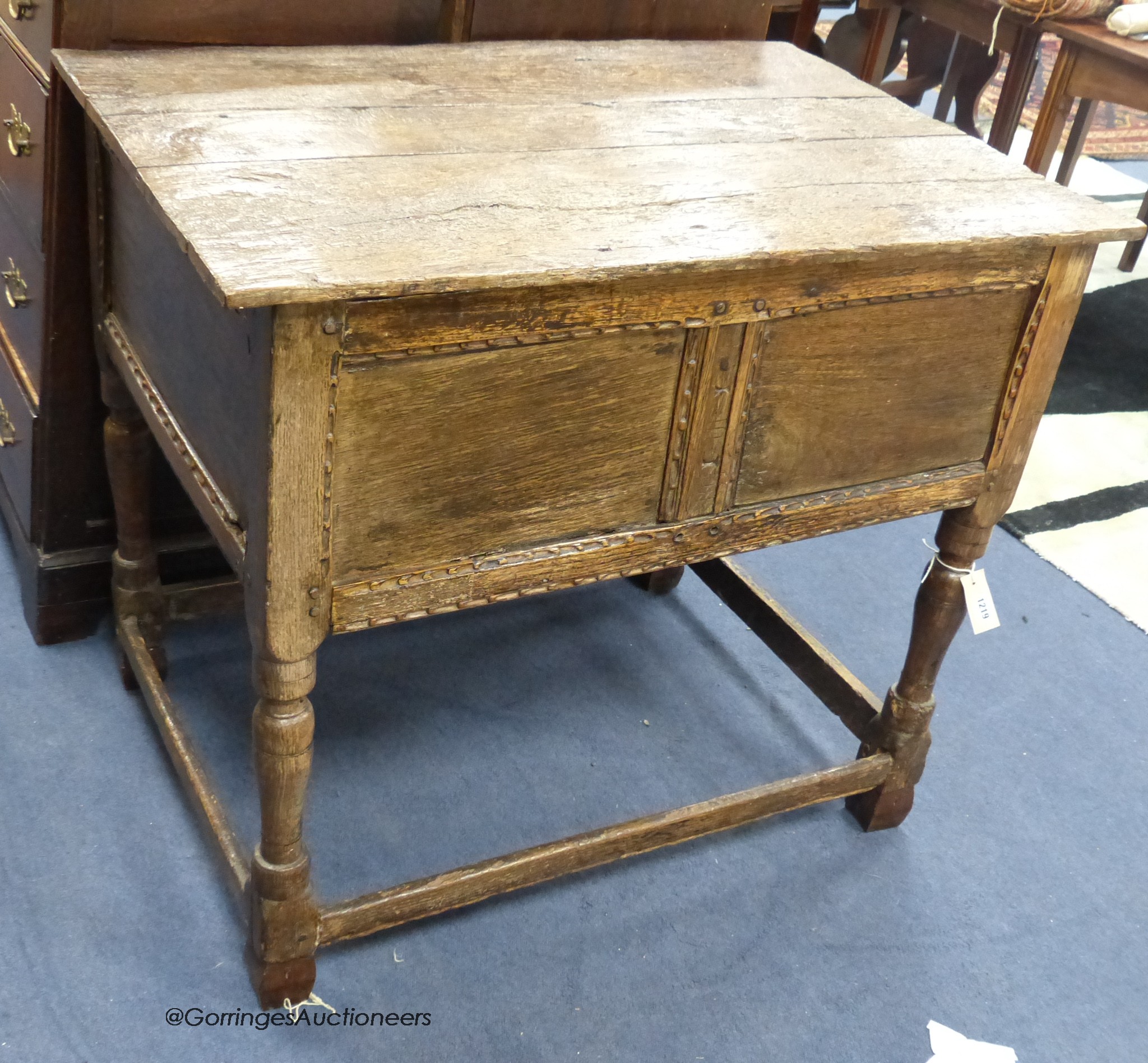 A 17th century and later oak chest on stand, width 97cm, depth 64cm, height 85cm